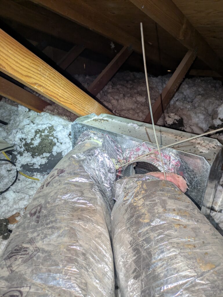 In this photo you can see a disconnected ductwork in Julia’s attic